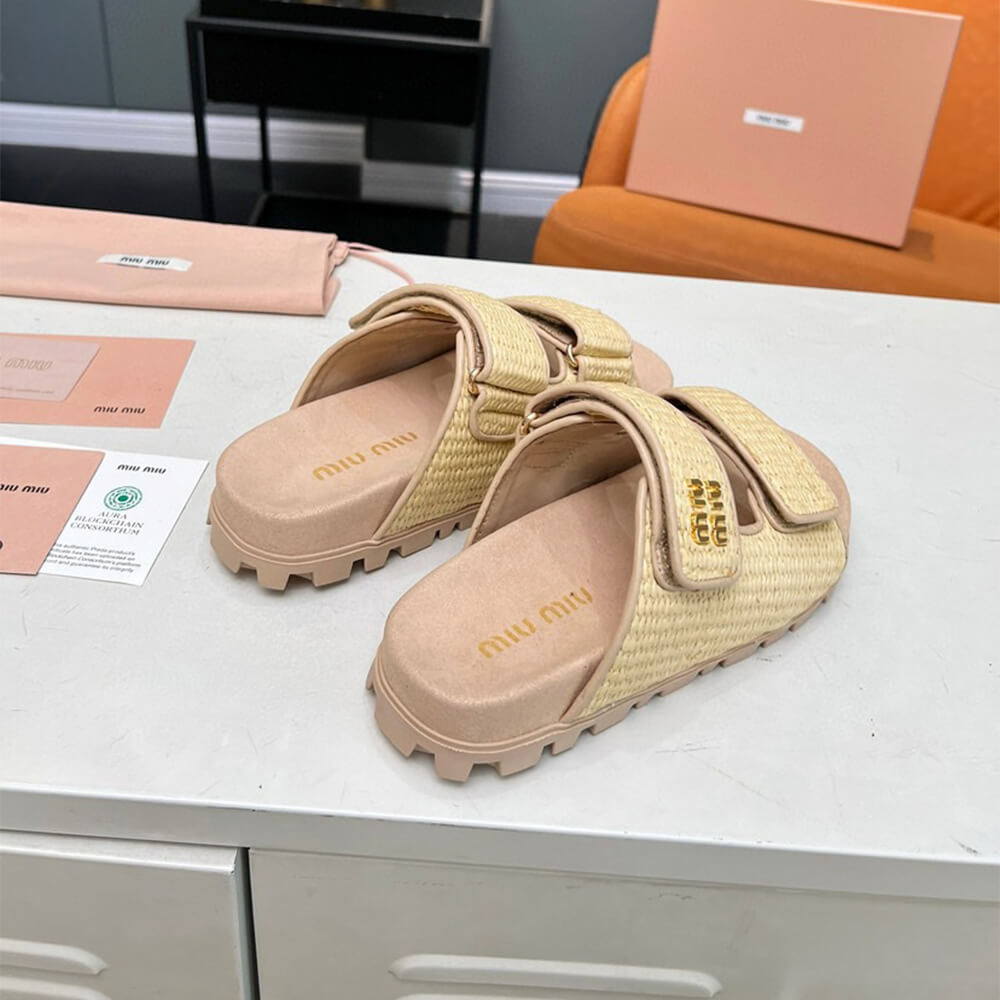 MiuMiu Raffia-effect woven fabric slides